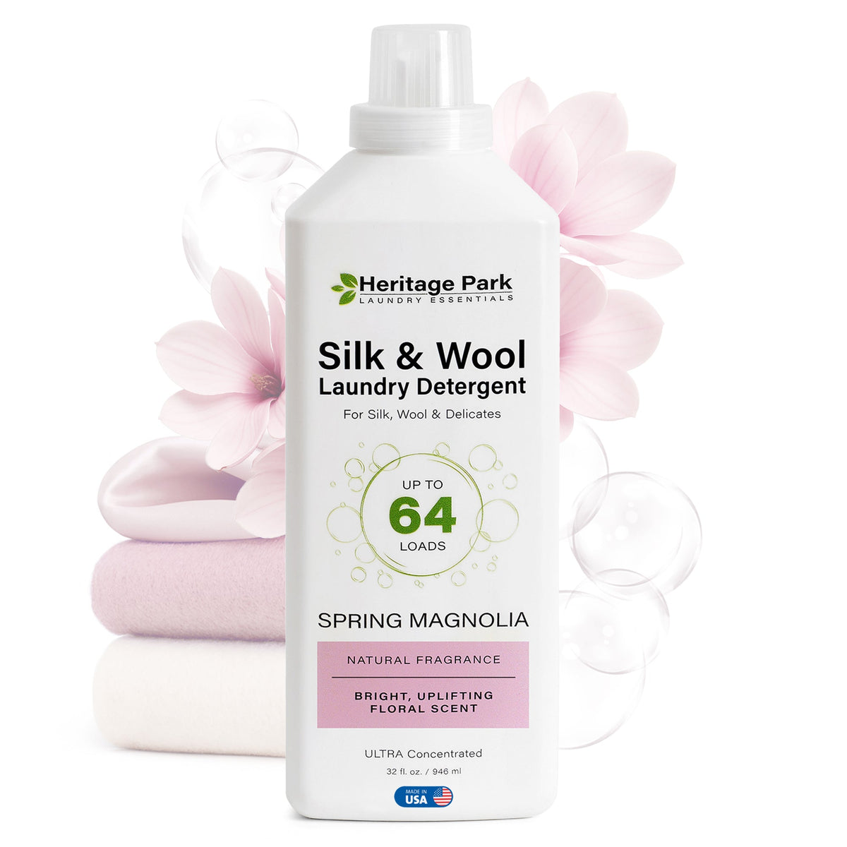 32oz bottle of Spring Magnolia scent Heritage Park Luxury for Silk and Wool Laundry Detergent with flowers in background