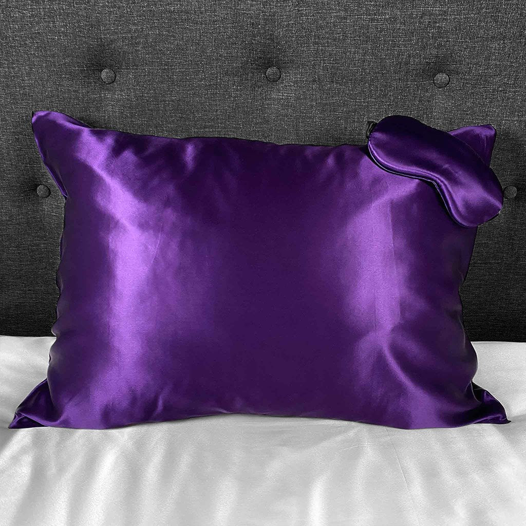 Plum silk pillowcase with matching sleep mask, offering a smooth and luxurious