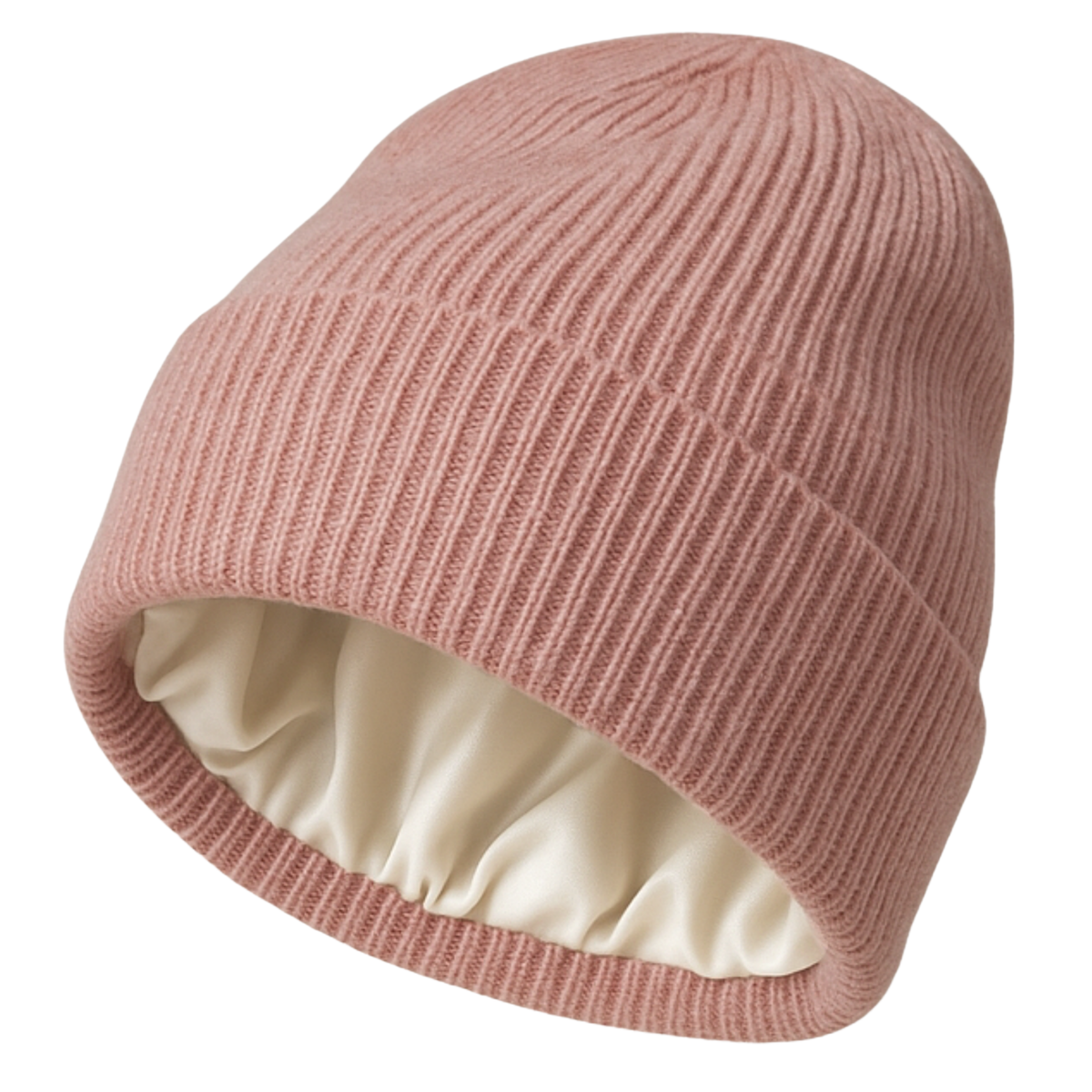 Pink knit beanie with ivory silk lining on a white background